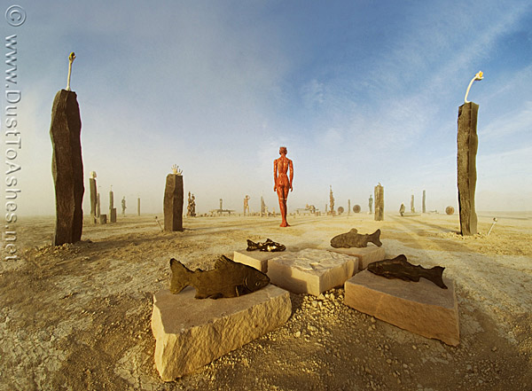 Evolution-Reaching-for-Balance-by-Daniel-James-Lynch-Park-Masonry-Sculpture-Art-Burning-Man-2009-Evolution-Desert-Nevada-Gerlach-Black-Rock-City-DustToAshes-Ales Fish sculpture in desert
