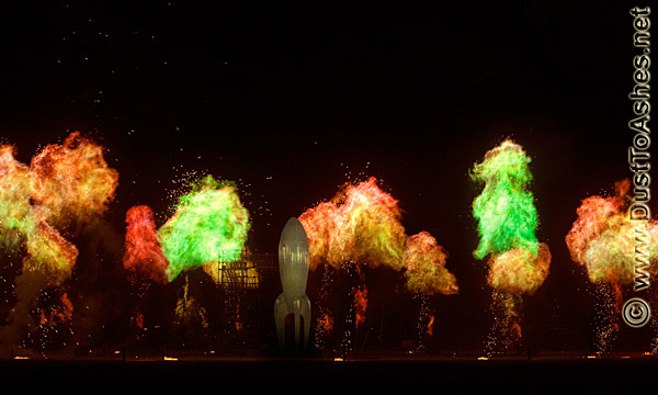 Raygun-Gothic-Rocket-take-off-fireworks-by-Sean-Orlando-Nathaniel-Taylor-David-Shulman-John-Manyjohns-Burning-Man-2009-Festival-Evolution-Dusttoashes-photo Burning Man night photo