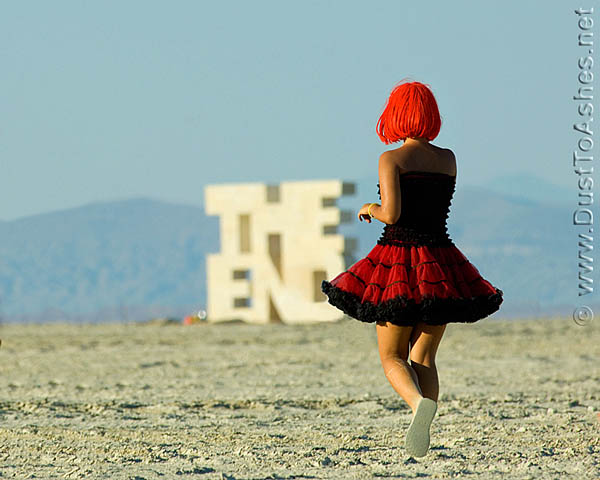 The End by Bob Marzewski Burning Man 2008 American Dream Dancing Girl Dancing Girl in front of The End sign