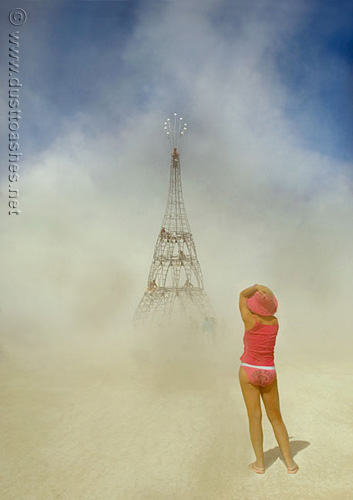 Burning Man girls watching the dust storm taking over the Elevation Tower