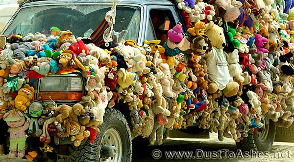 Car decorated with staffed animals