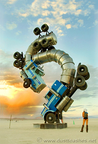 Burning Man girl observing the surreal deset art installtion