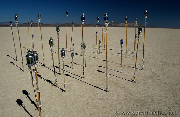 Aluminous Prayer Wheel by Aaron Ximm Field of blue lanterns in desert