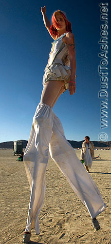Burning man woman stilts costumes