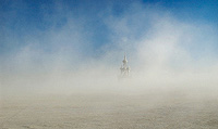 Church like temple re-emerging from dust storm in Nevada desert