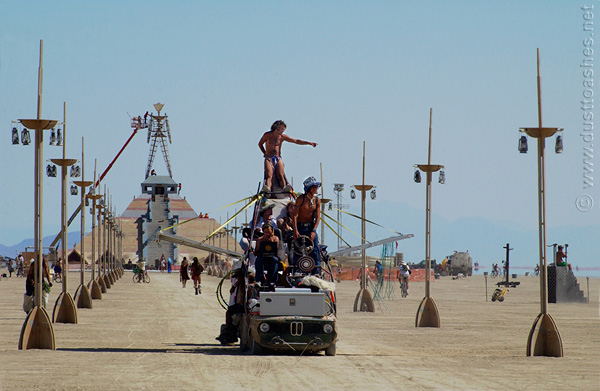Burning Man art car in front of the Man