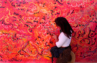 Girl looking at art at Burning Man festival