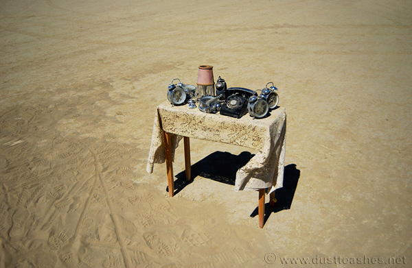 Table with clock in desert Night table full of alarm clocks