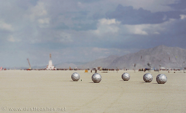 Loose silver spheres on playa