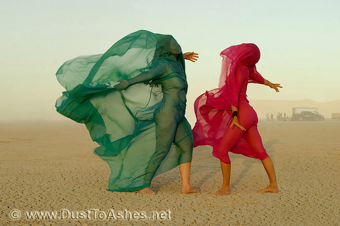 Wind worshipping women at Burning Man festival