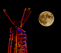 Burning Man looking at Blue Super Moon