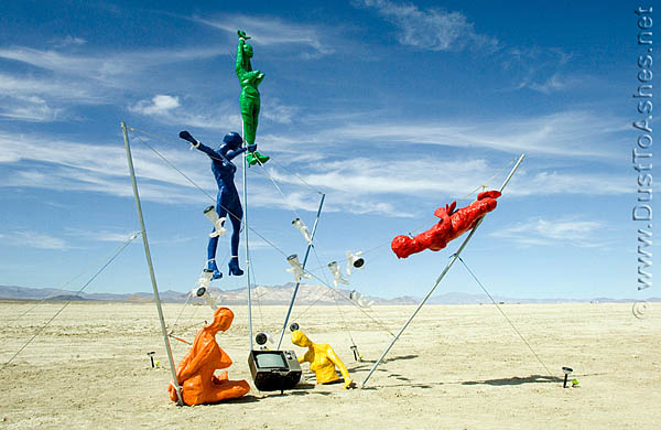 Burning Man 2008 he Babysitter by Stefan Babchuk run for your lives Desert Art Festival Television photos pics pictures Mannequins around television just like modern babysitters