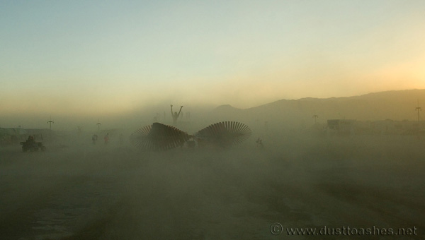 Duel Nature by Burning Man artist Kate Raudenbush during dust storm Double helix art installation in front of Center Camp