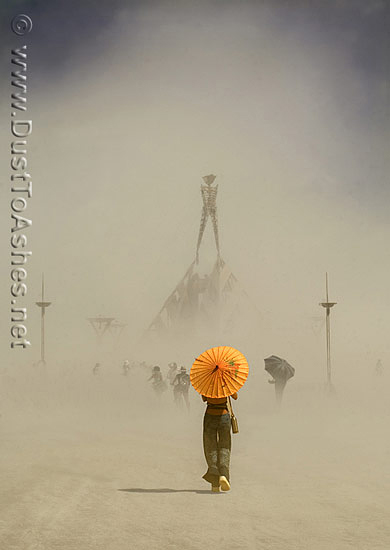 Woman with orange sun umbrella